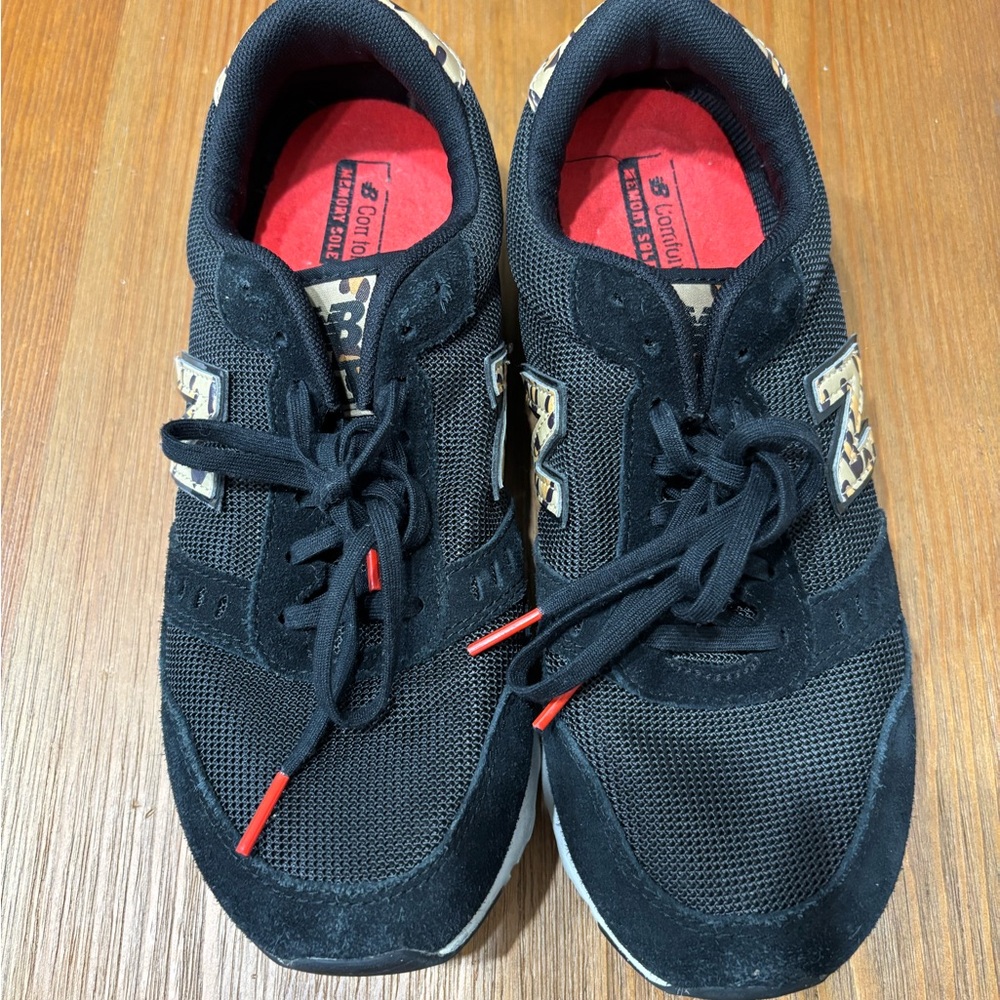 New Balance Black and cheetah print.